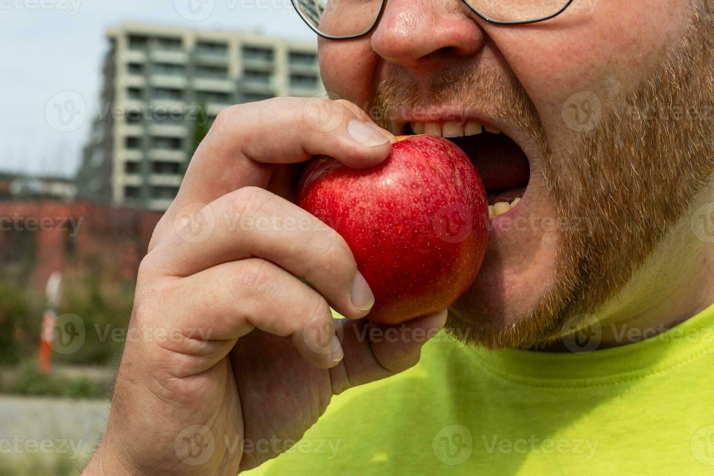 AI generated Healthy Bite Bearded Man Enjoys Apple photo