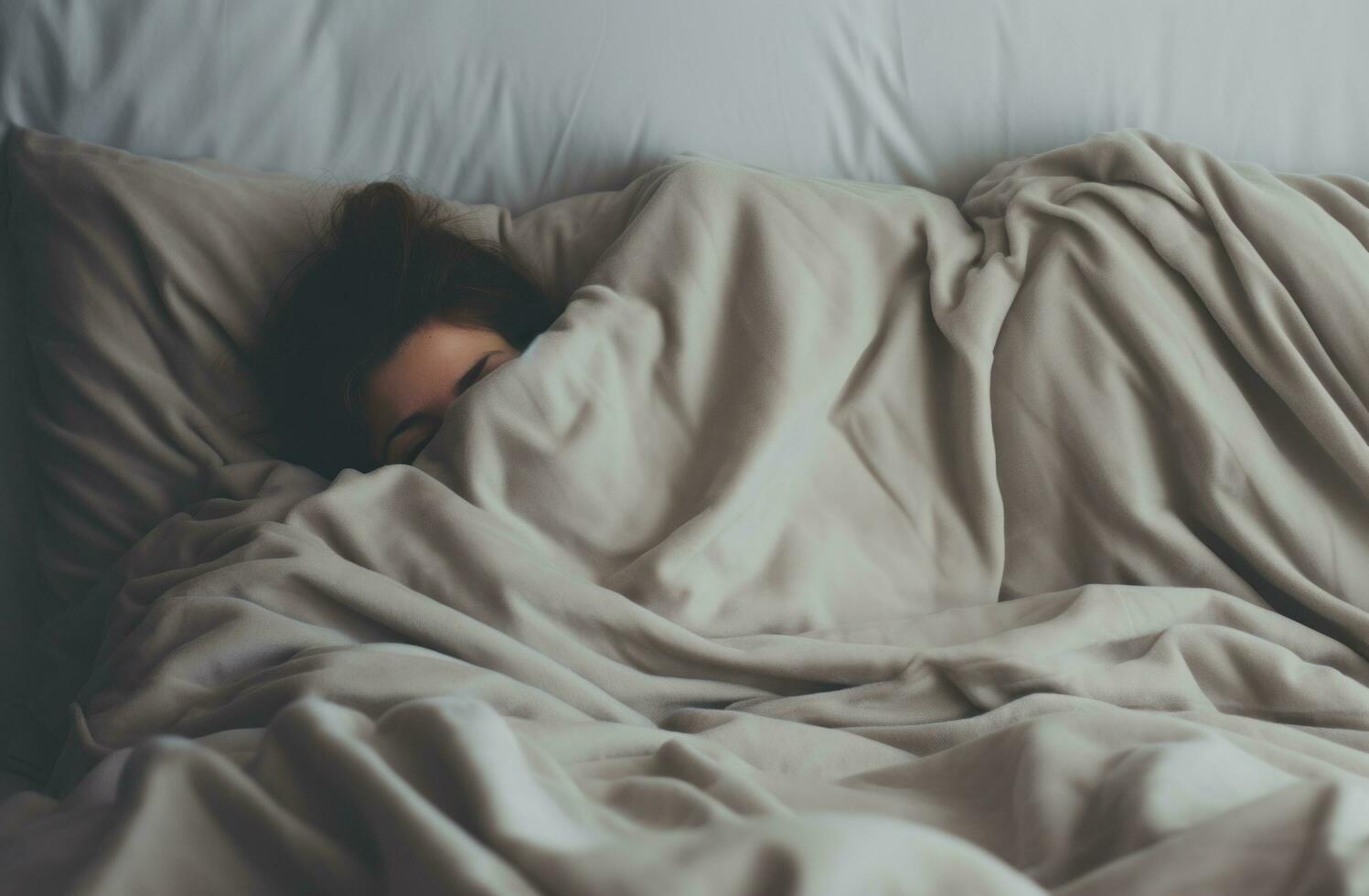 AI generated f a person on a bed dressed in a blanket photo