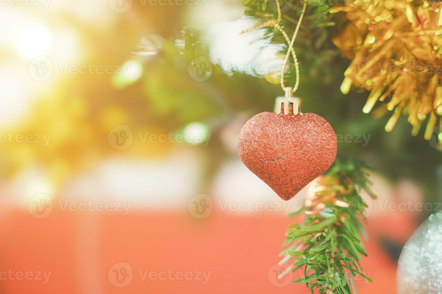 Decorated with ornaments and lights Christmas tree with bokeh background. Merry Christmas and Happy Holiday concept. photo
