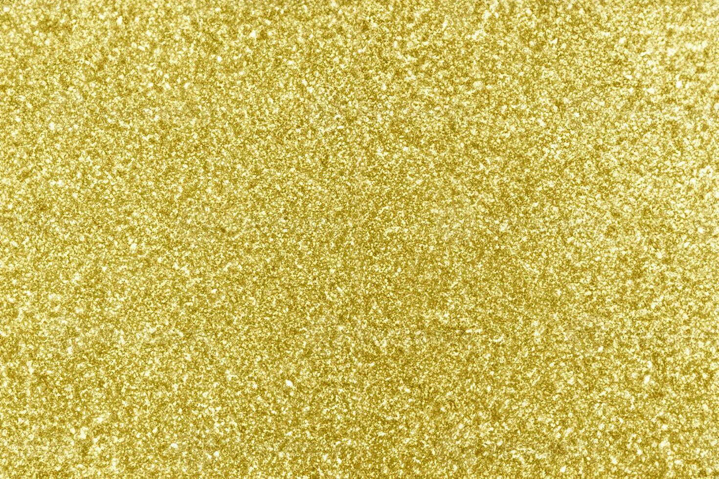 Abstract gold glitter sparkle bokeh light background photo