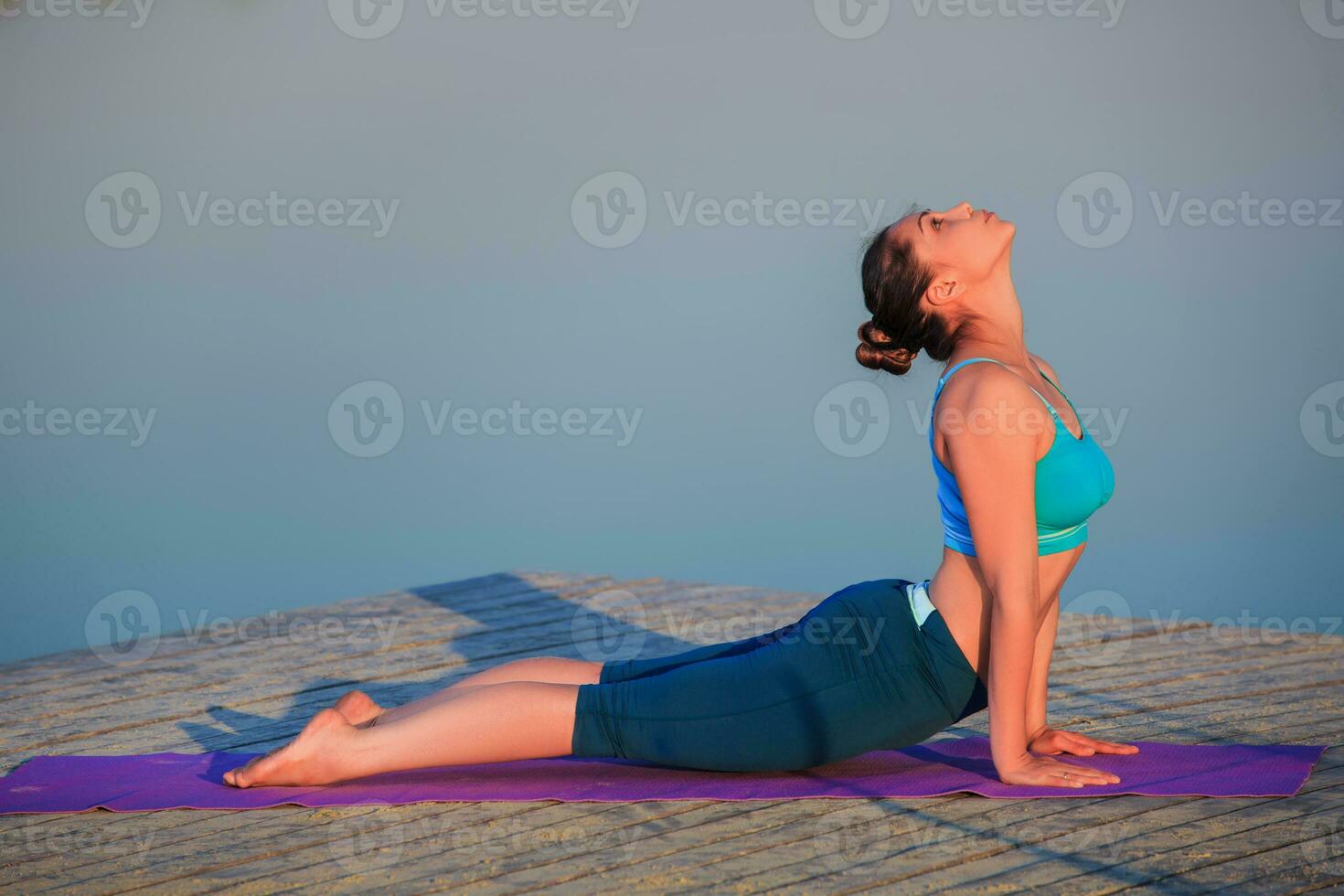 girl doing yoga exercise photo
