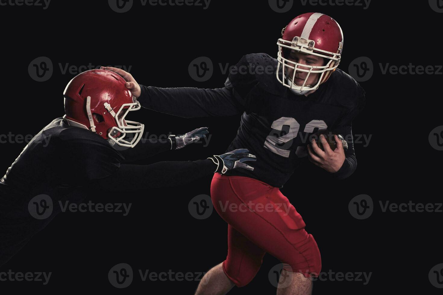 Football player on dark background photo