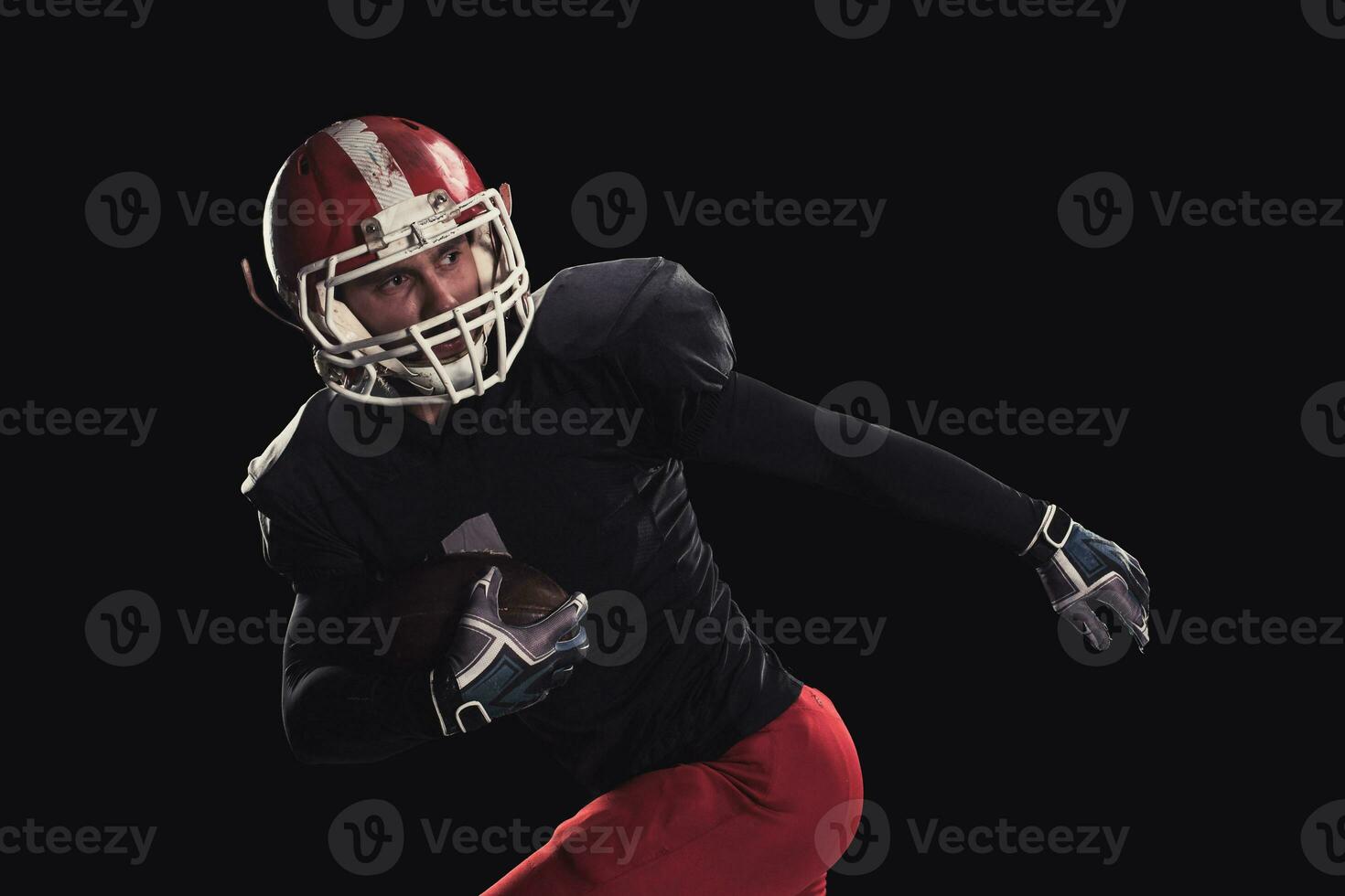 Football player on dark background photo