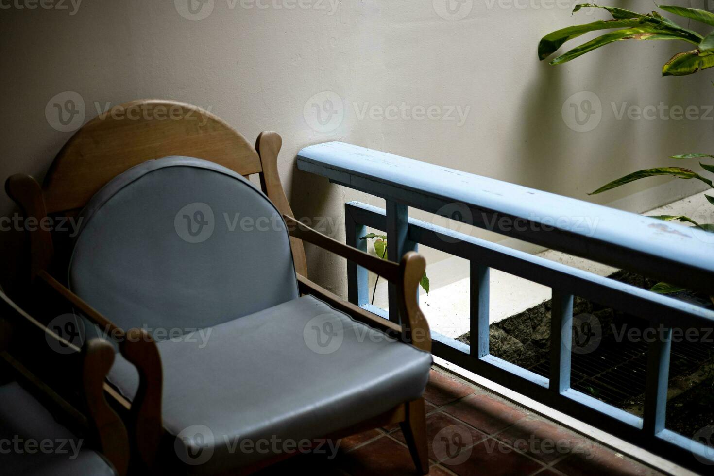 Wooden Chair On Balcony photo