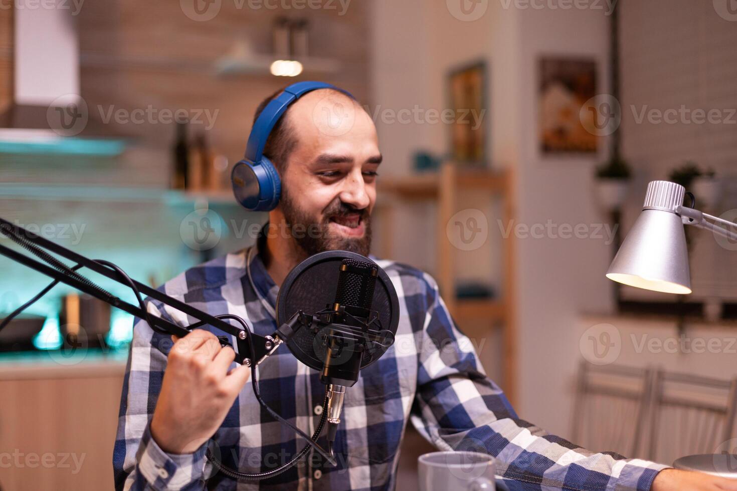 Vlogger recording podcast using production station in home studio. Creative online show On-air production internet broadcast host streaming live content, recording digital social media communication photo