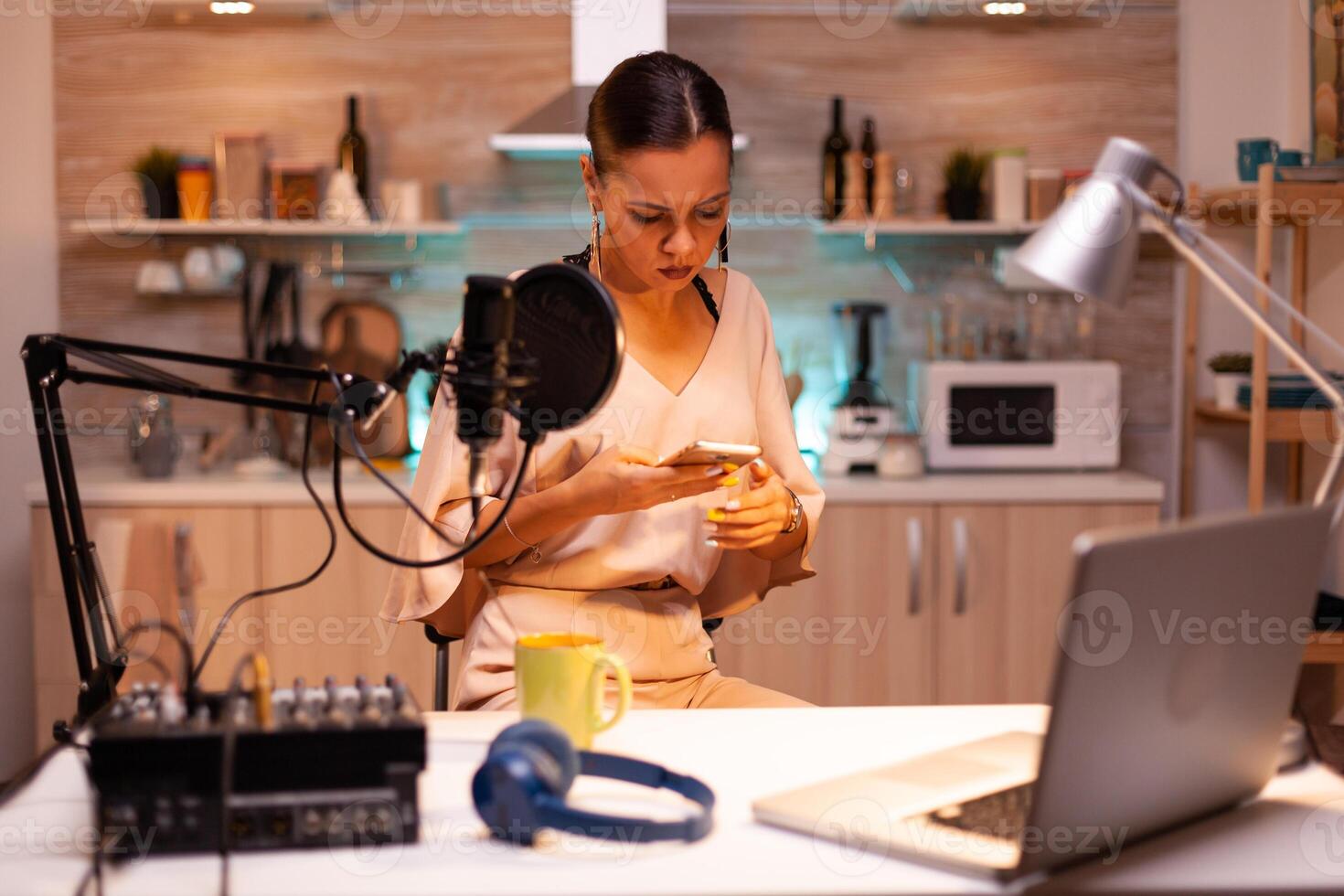 Social media star answering questions from online using phone in podcast. Creative online show On-air production internet broadcast host streaming live content, recording digital media photo