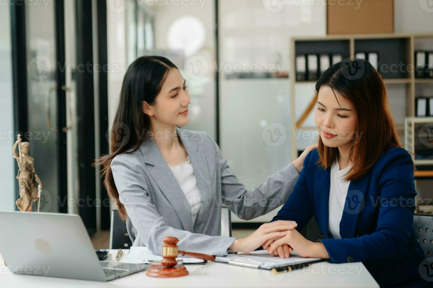 Asian Business law concept, Lawyer business lawyers are consulting lawyers for women entrepreneurs to file copyright lawsuit photo