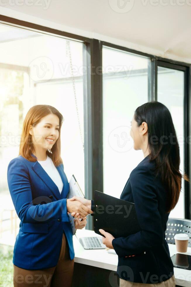Business partnership handshake concept.Photo two coworkers handshaking process.Successful deal after great meeting. photo