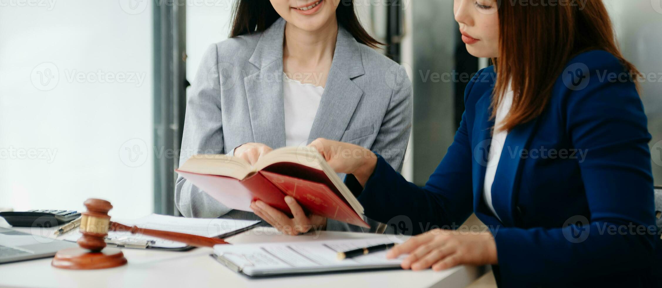 Asian Business law concept, Lawyer business lawyers are consulting lawyers for women entrepreneurs to file copyright lawsuit photo