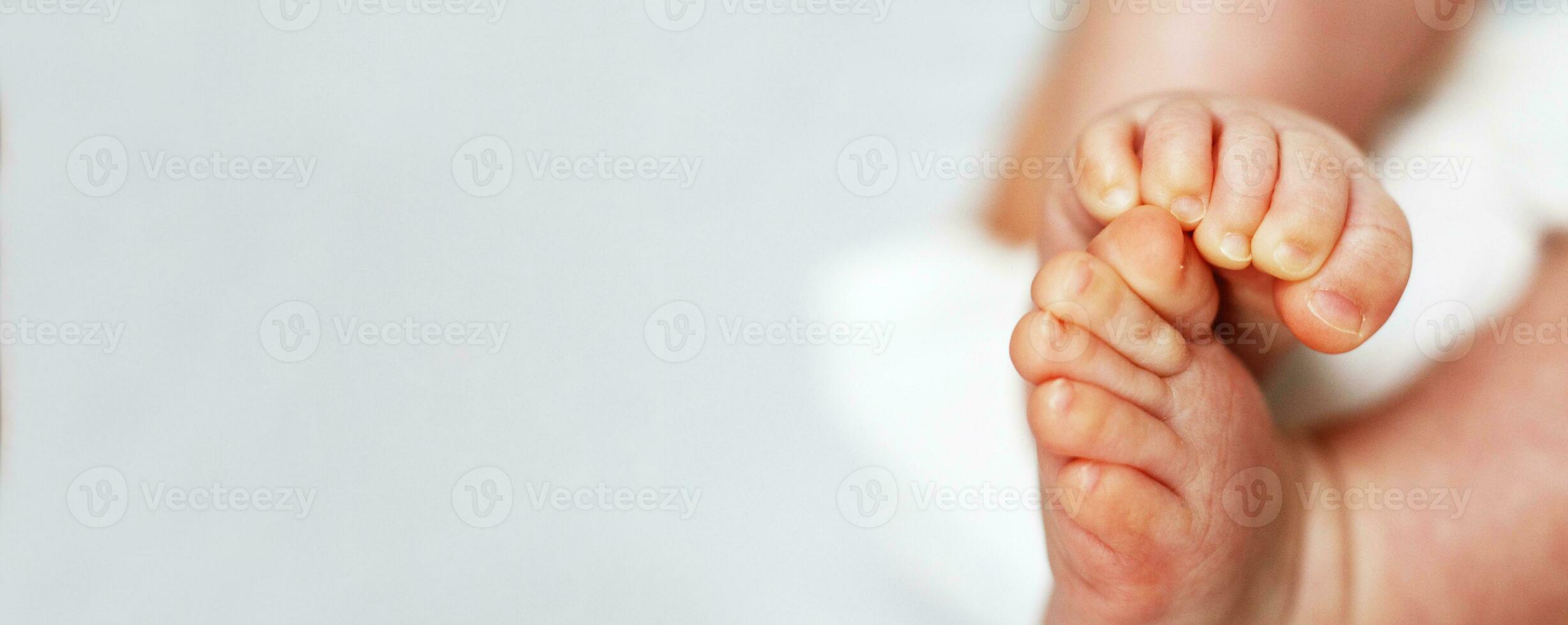 baby feet close up on white background photo