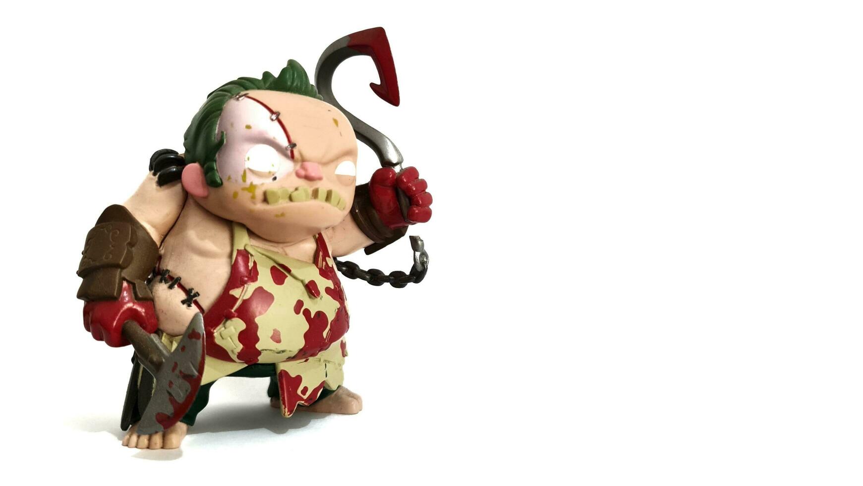 Jakarta, Indonesia on November 20, 2023. Isolated white photo of an action figure chibi doll Funko Pop Vinyl Figure NEW FROM UK item Dota 2 - Pudge with Cleave