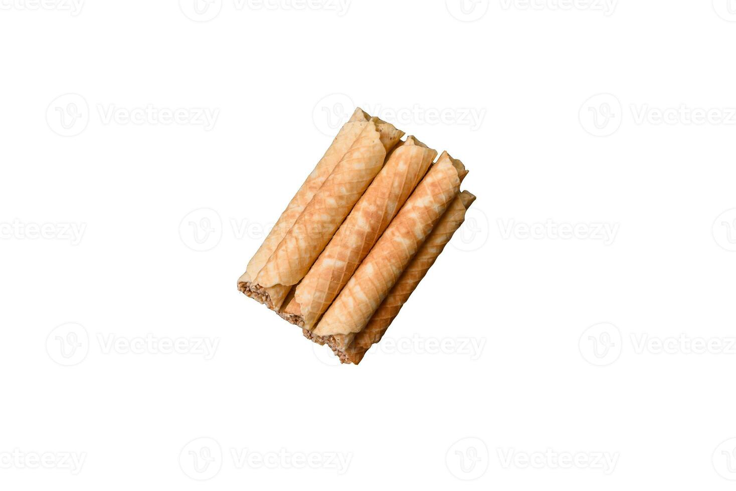 Delicious crispy wafer rolls with cream filling with nuts photo