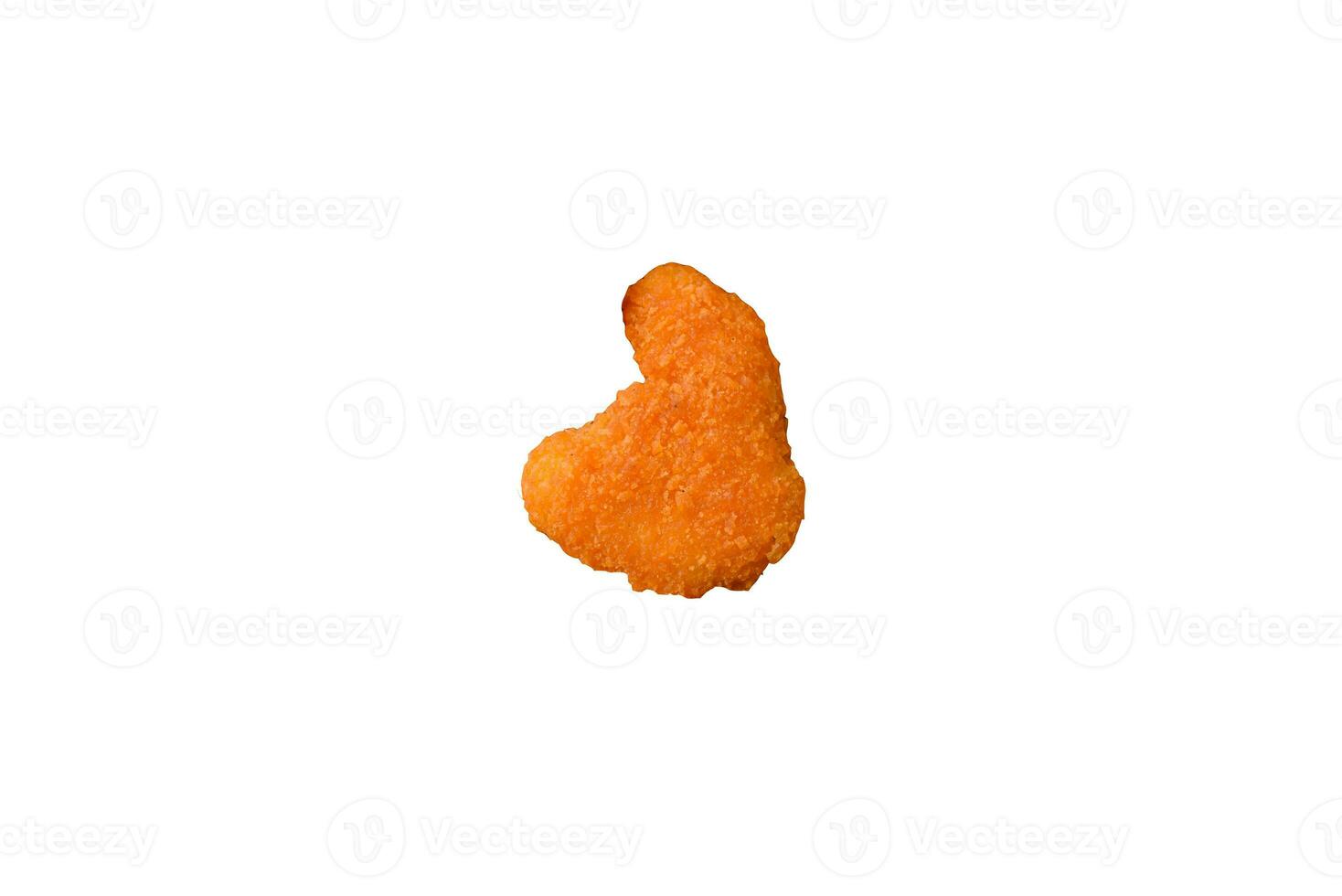 Delicious fresh crispy chicken nuggets on a dark concrete background photo