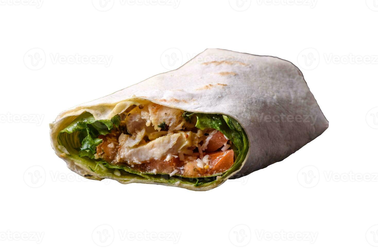 Delicious fresh roll with chicken, tomatoes, lettuce and cucumber in pita bread photo