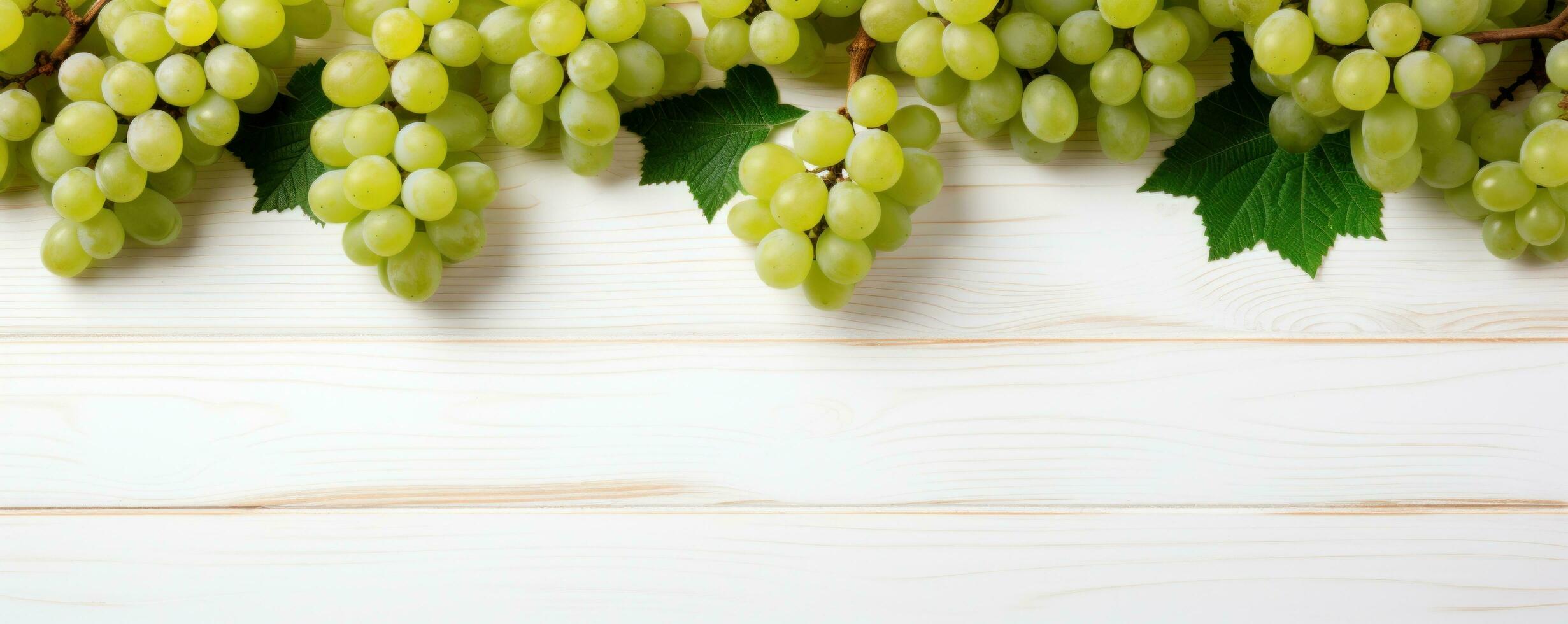 AI generated grapes hanging from a white wooden background with leaves photo