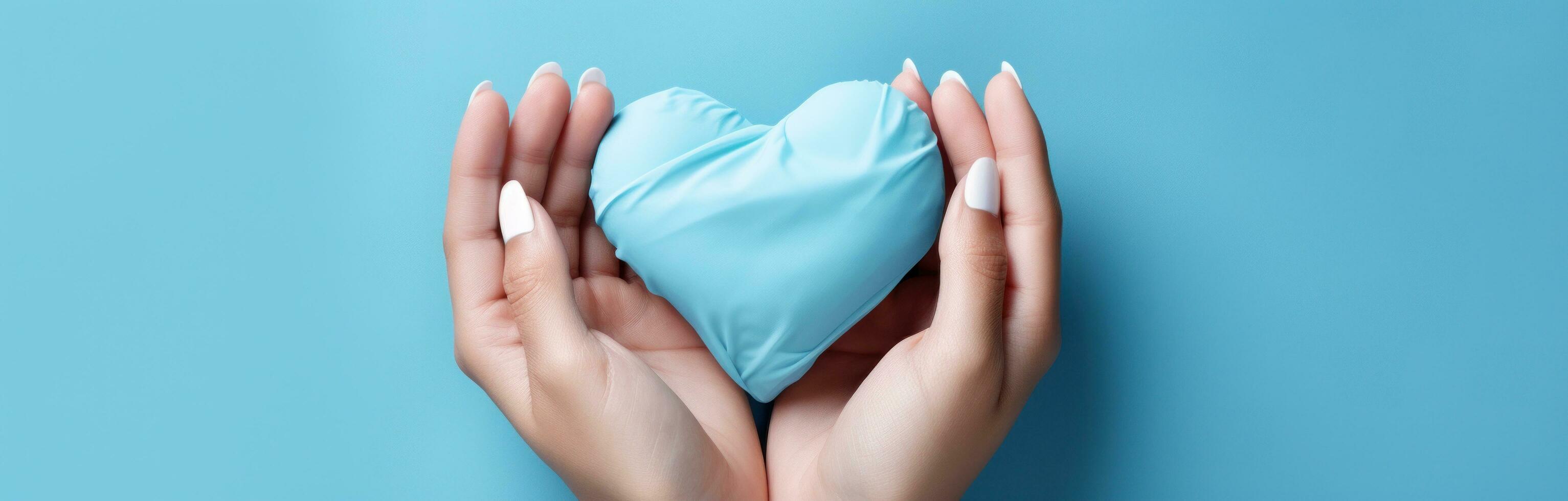 AI generated hands in blue gloves with blue heart shaped glove on blue background, photo