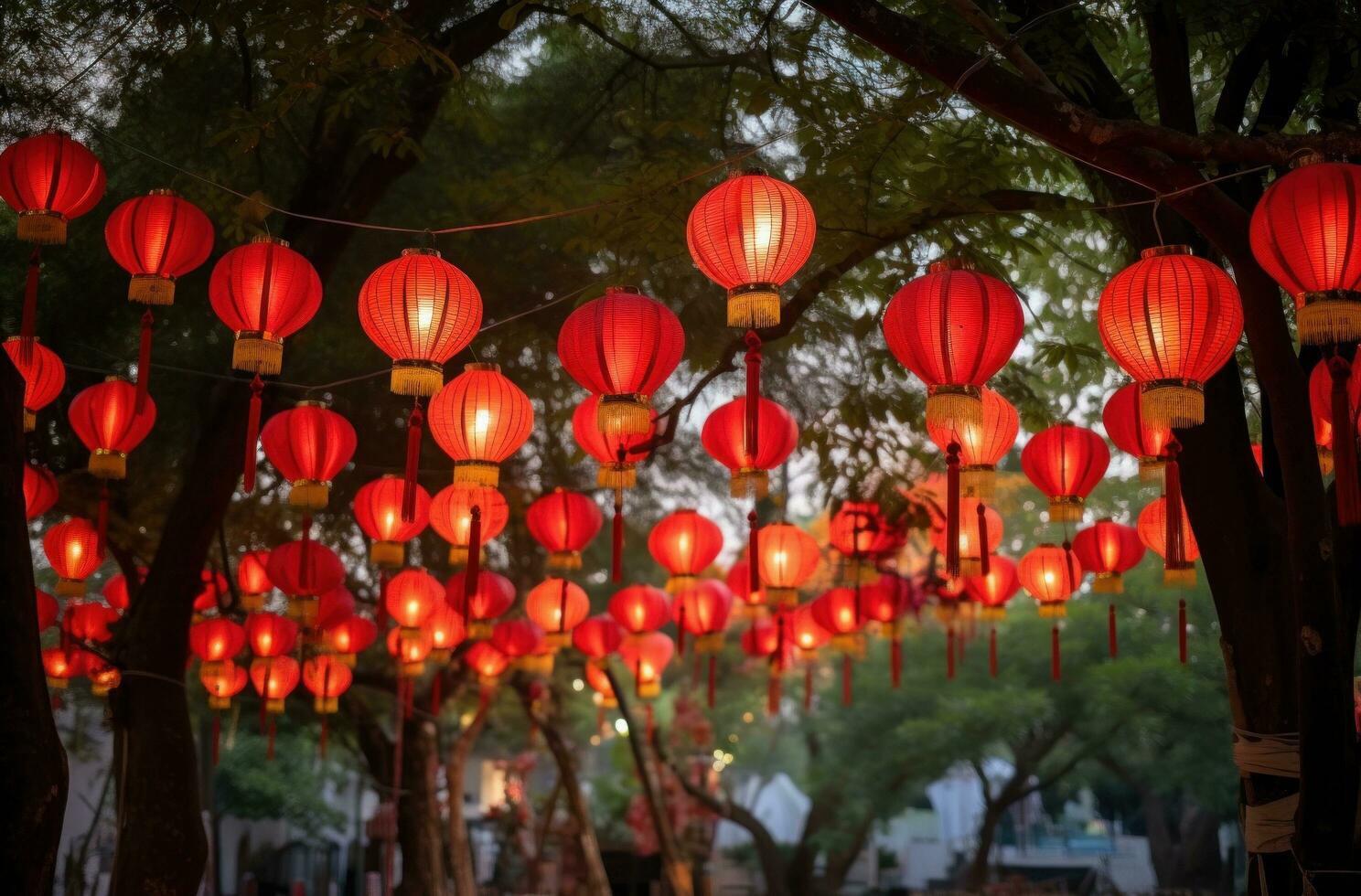 AI generated red cloth hanging lanterns illuminated under tree. photo