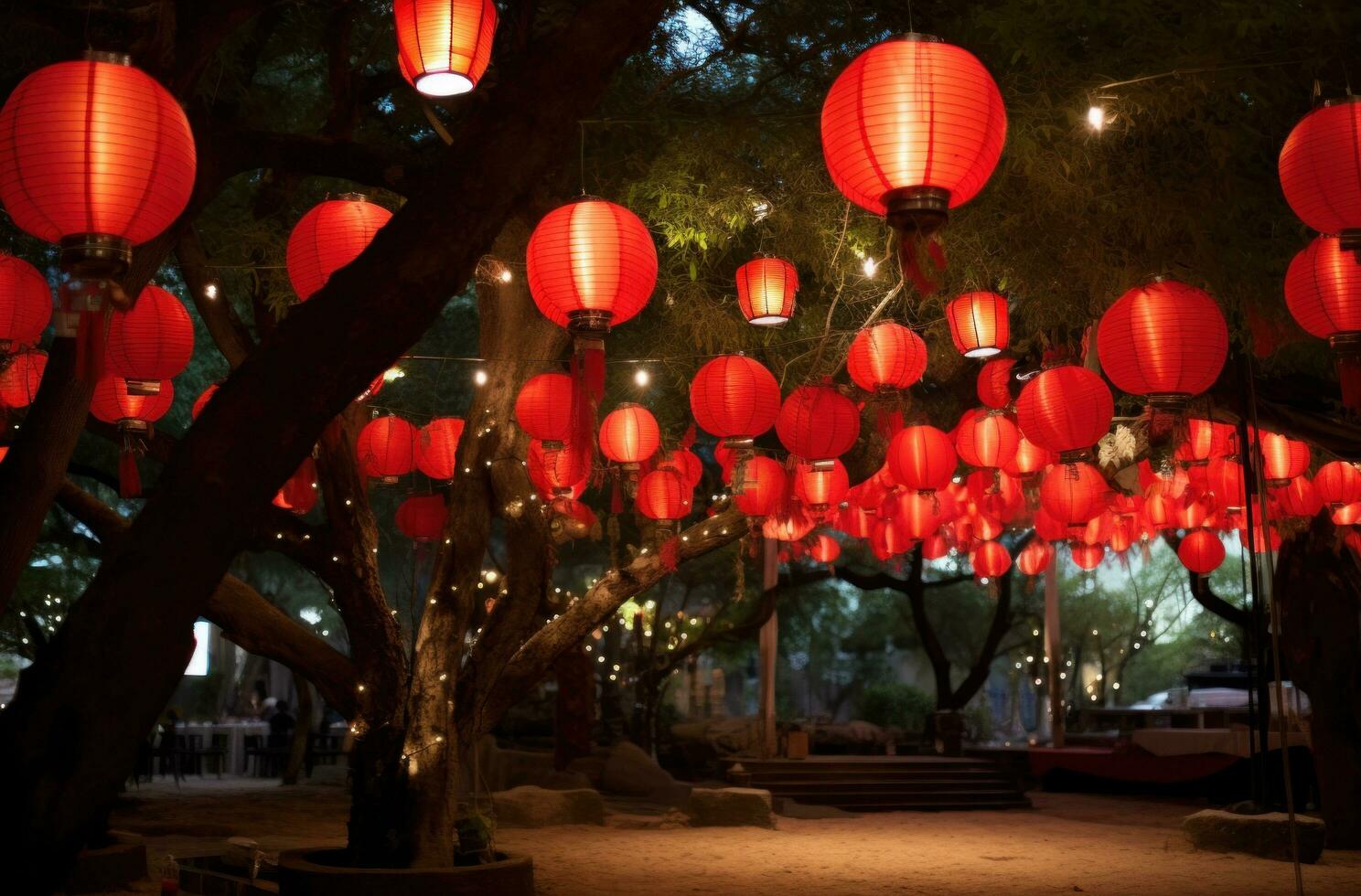 AI generated red cloth hanging lanterns illuminated under tree. photo