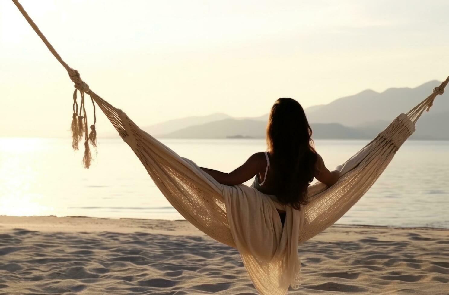 AI generated woman sitting in hammock on the beach with her eyes closed photo