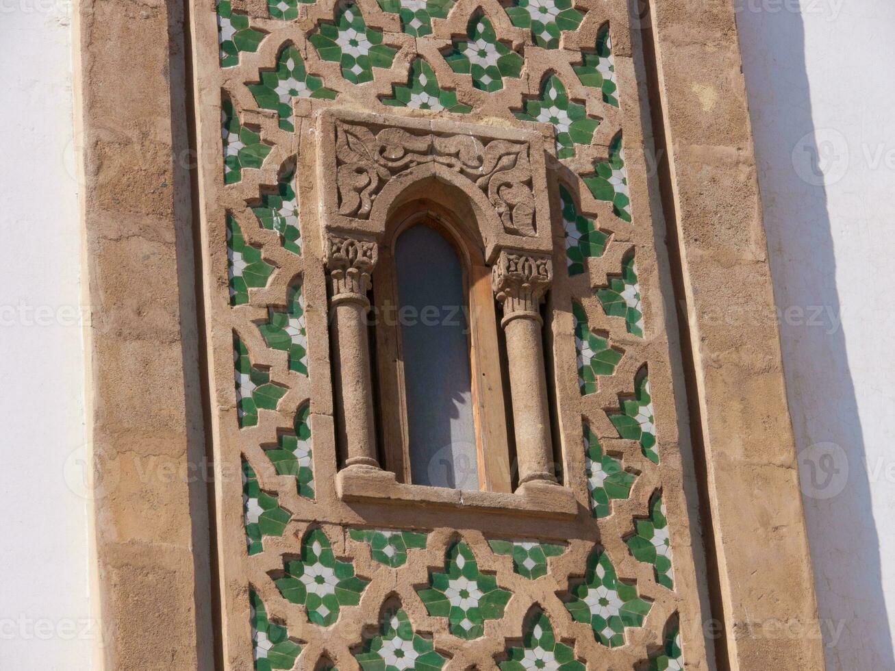 a window with a clock on it photo