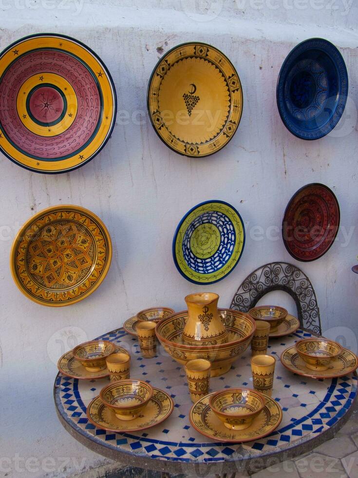a table with plates and bowls on it photo