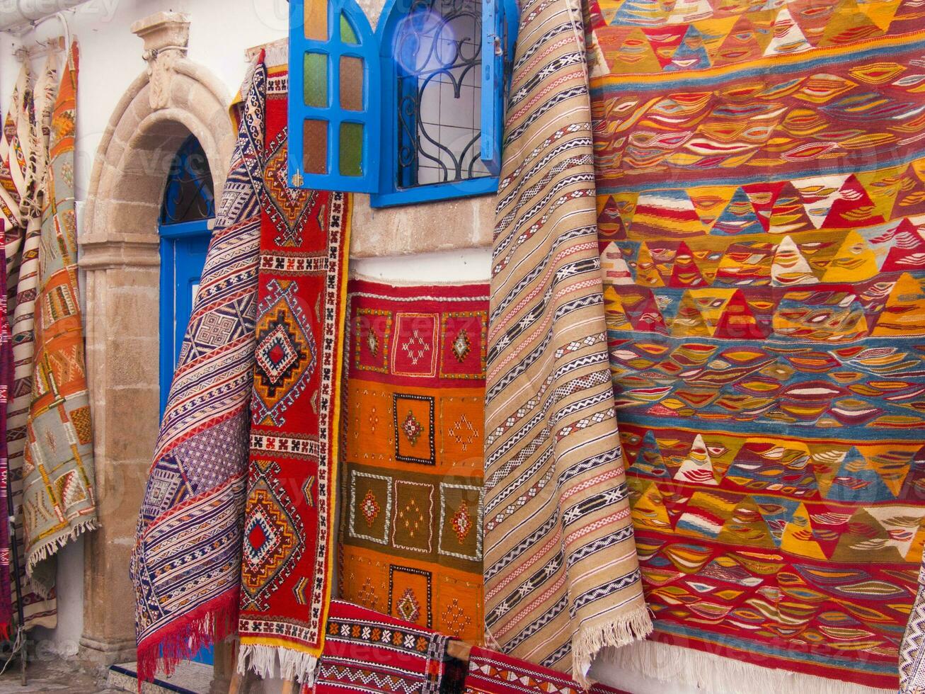 tapestries in the souk of kasr el-kubra, moroc photo