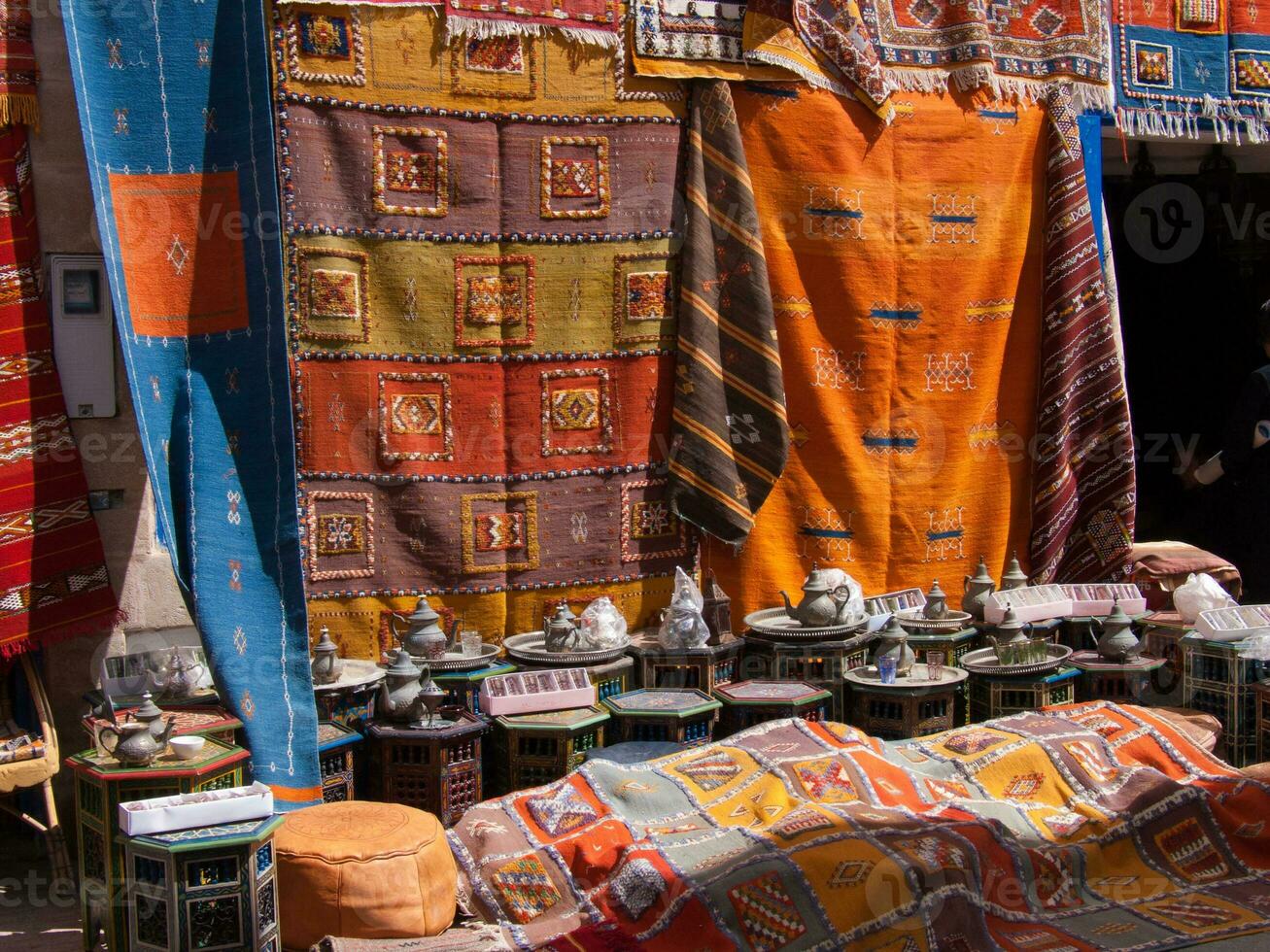 a colorful rug on the ground photo