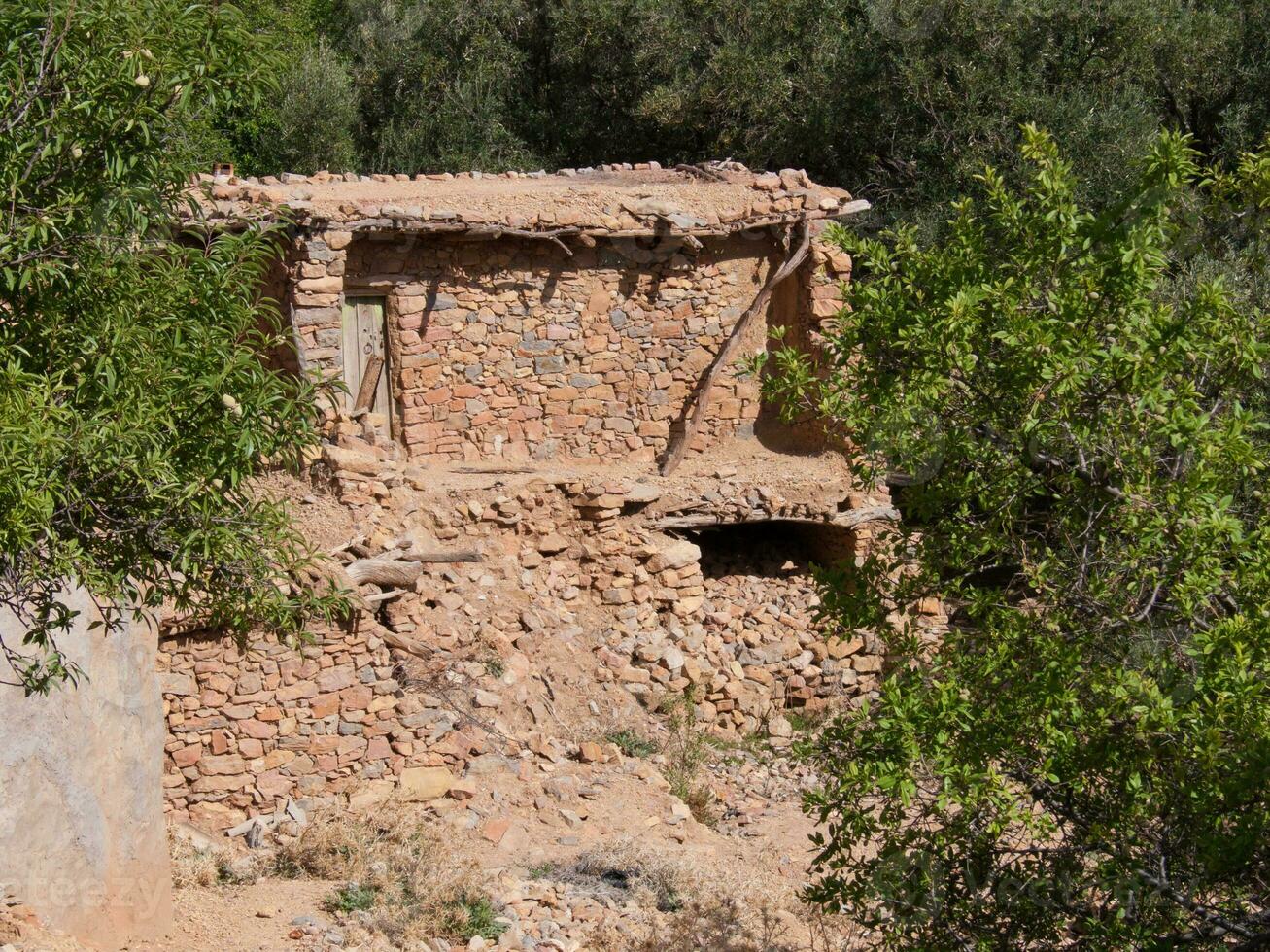 a small building with a door on it photo