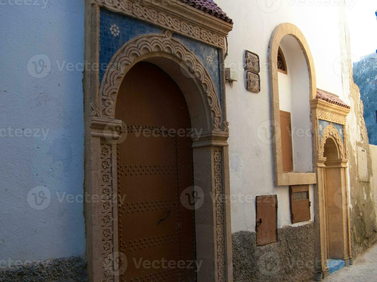 a building with a door and a window photo