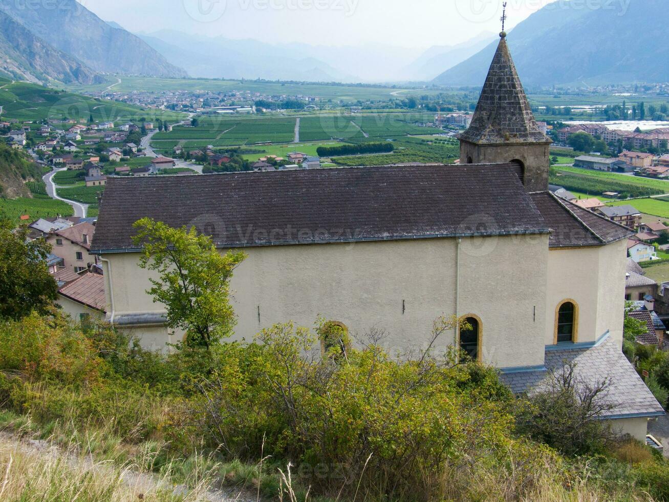 a church with a steeple photo