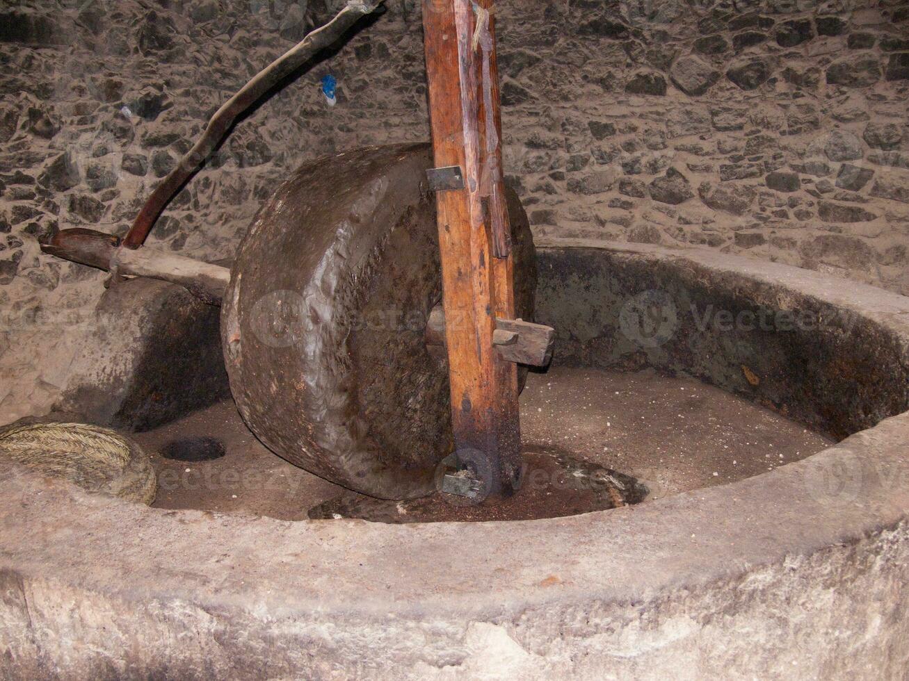 a large wheel in a cement mixer photo