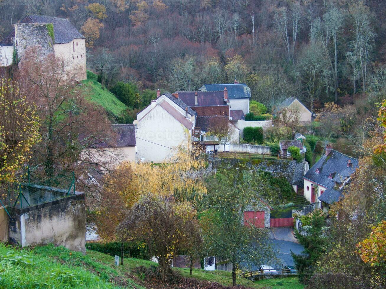 a view of a village in the countryside photo