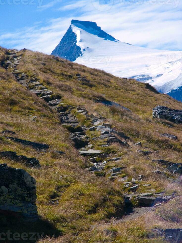 a mountain with snow on it photo