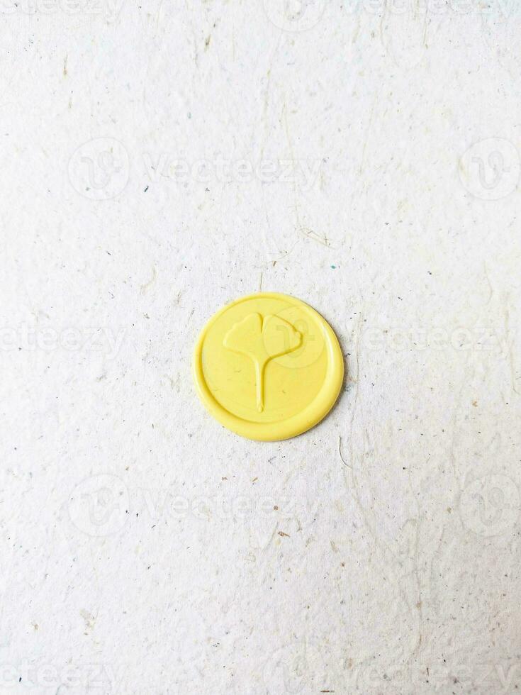 wax seal stamp on white paper background. Top view. Copy space. photo