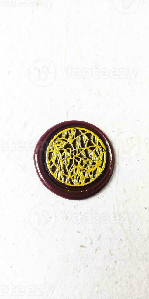 wax seal stamp on white paper background. Top view. Copy space. photo