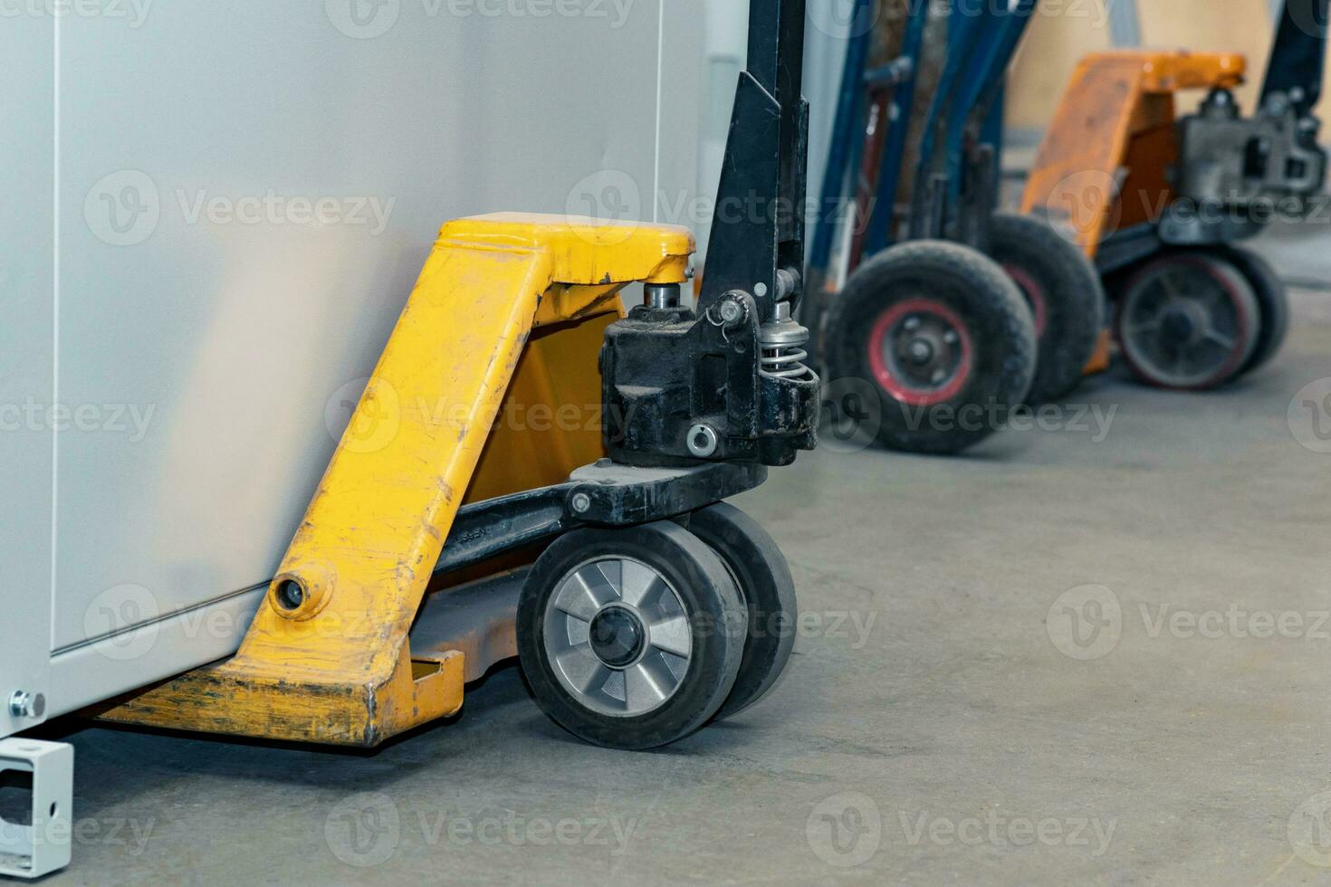 hydraulic jacks for storage pallets close-up photo