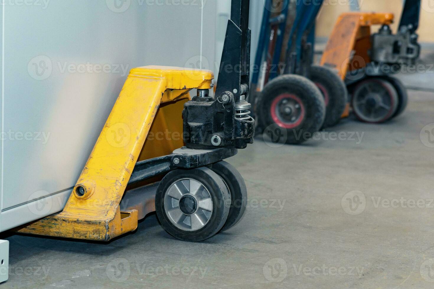 hydraulic jacks for storage pallets close-up photo