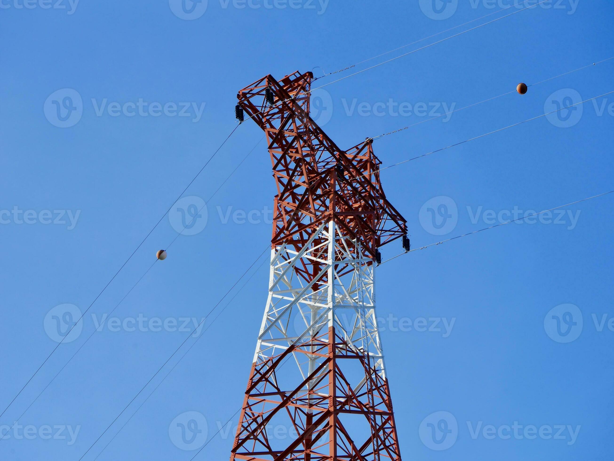 High voltage power lines tower on green mountain, Red high Pylon high