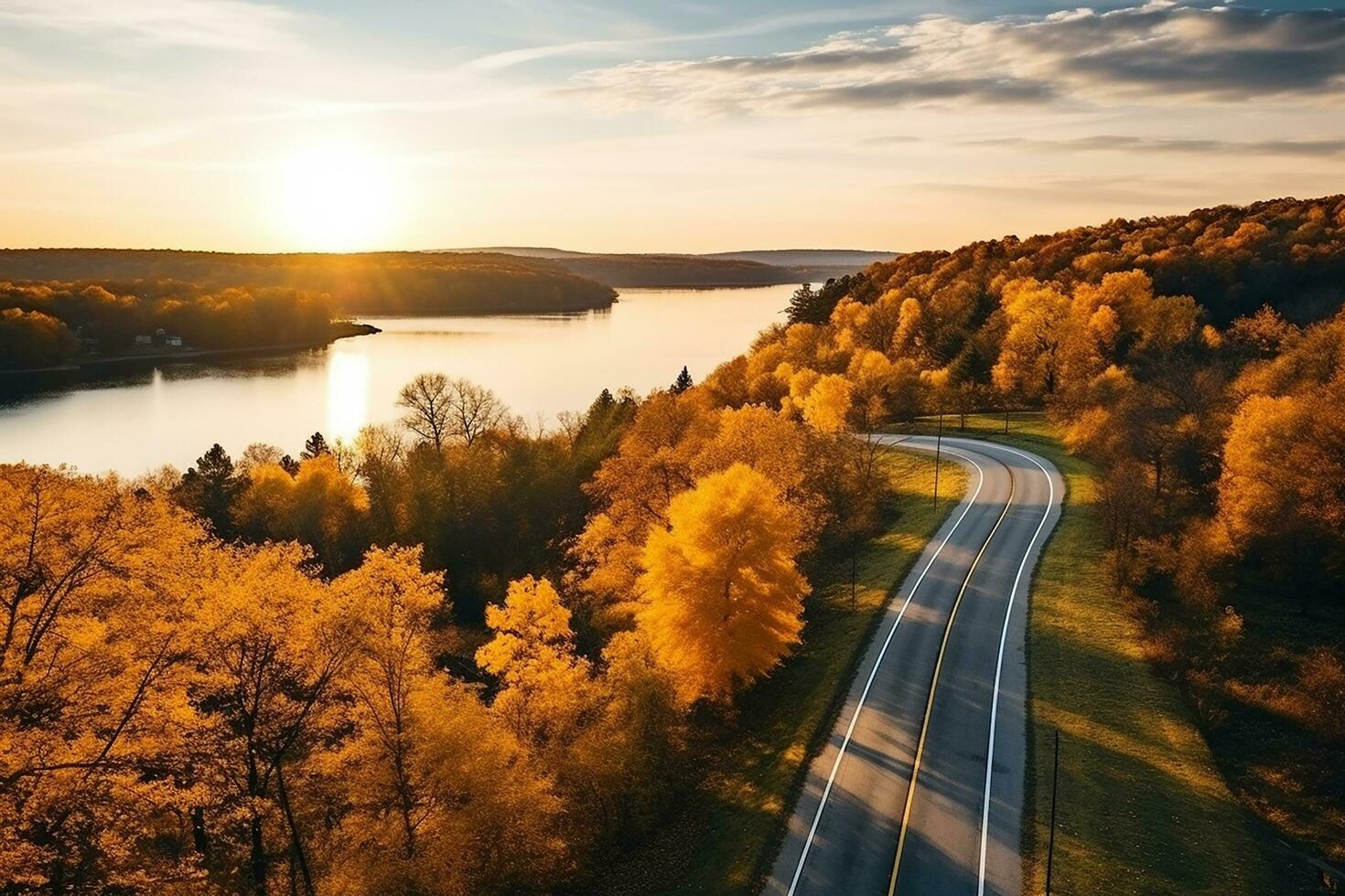 ai generado aéreo ver de montaña la carretera en bosque a puesta de sol en otoño. parte superior ver desde zumbido de la carretera en bosque. hermosa paisaje con calzada en sierras, pino árboles, verde prados foto