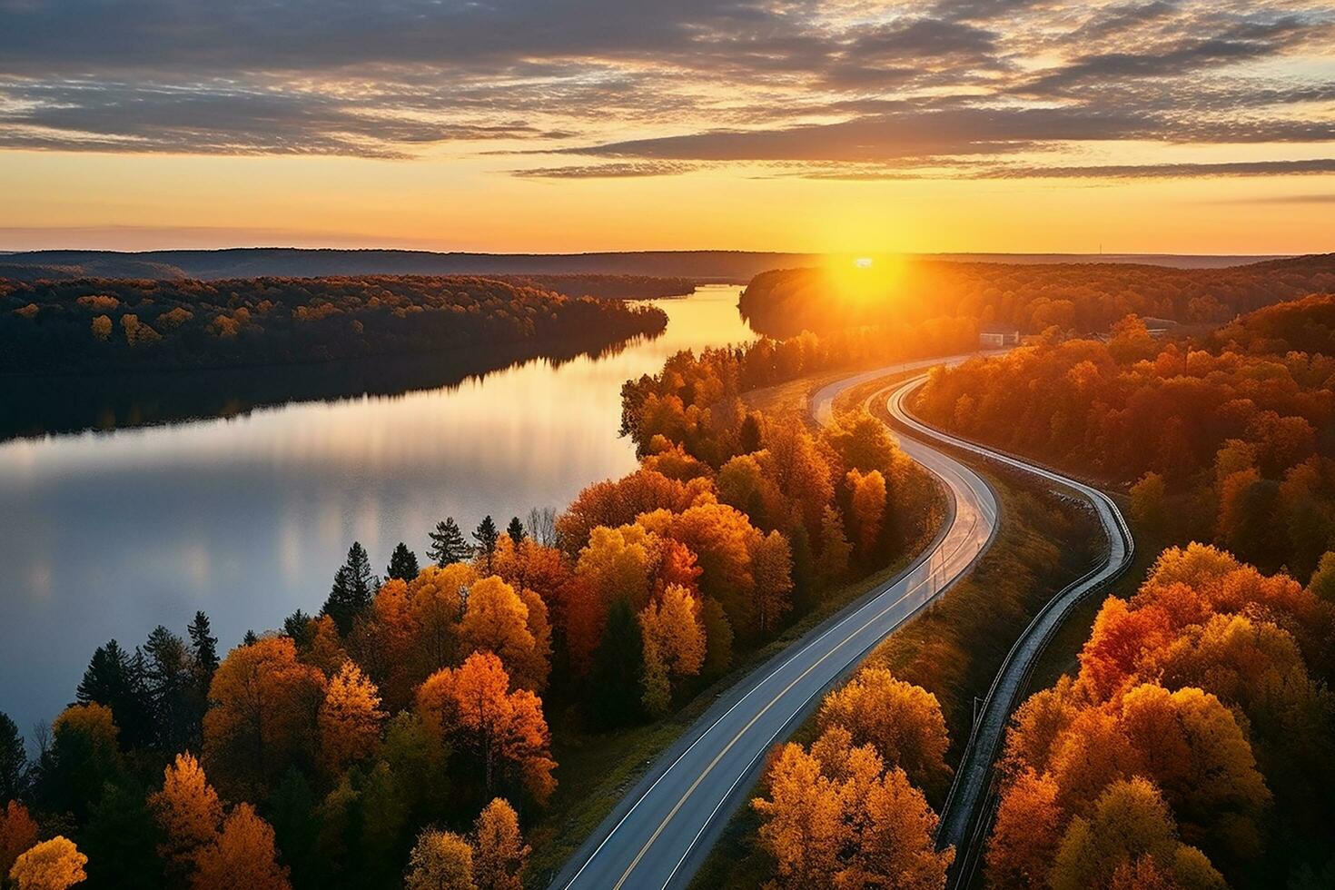 ai generado aéreo ver de montaña la carretera en bosque a puesta de sol en otoño. parte superior ver desde zumbido de la carretera en bosque. hermosa paisaje con calzada en sierras, pino árboles, verde prados foto