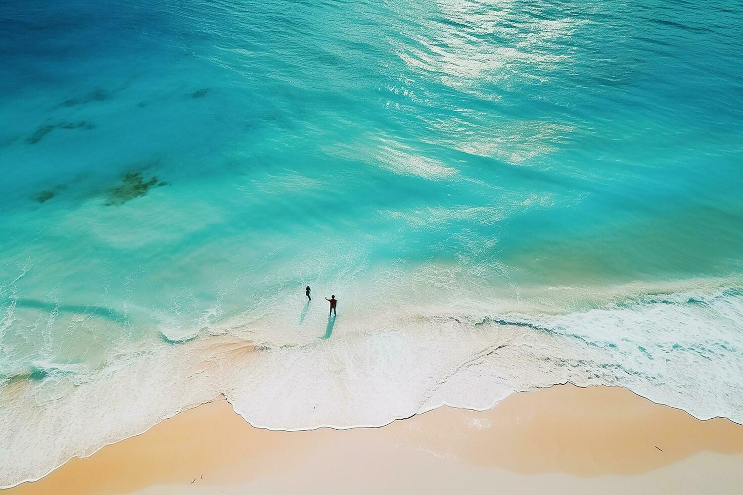 AI generated Aerial view of amazing beach with couple walking in sunset light close to turquoise sea. Top view of summer beach landscape photo
