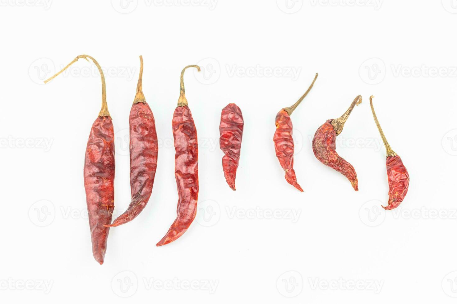 Dried red chili on white background. Clipping path included. photo