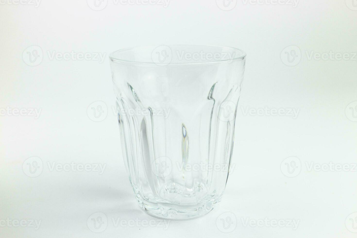 Empty glass isolated on white background, clipping path included for easy editing. photo