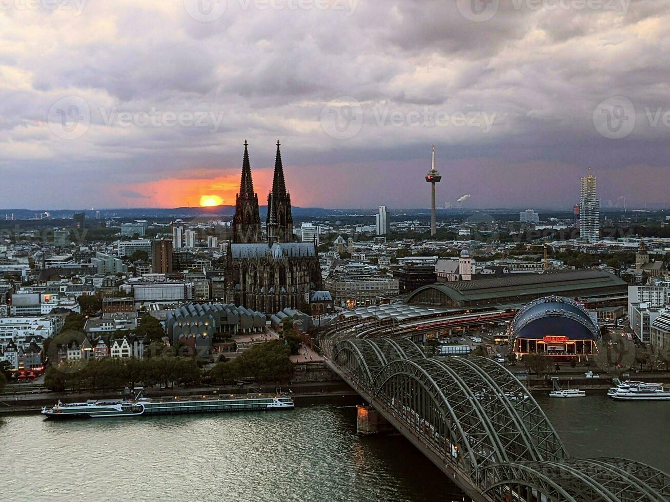 Sunset over Cologne, cloudy sky photo