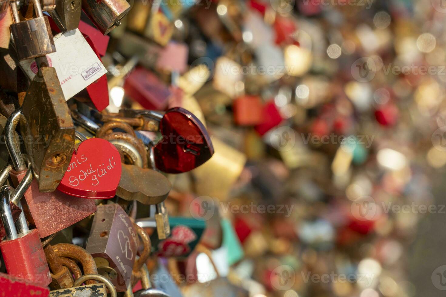 Many locks hang on the Hohenzollern bridge photo