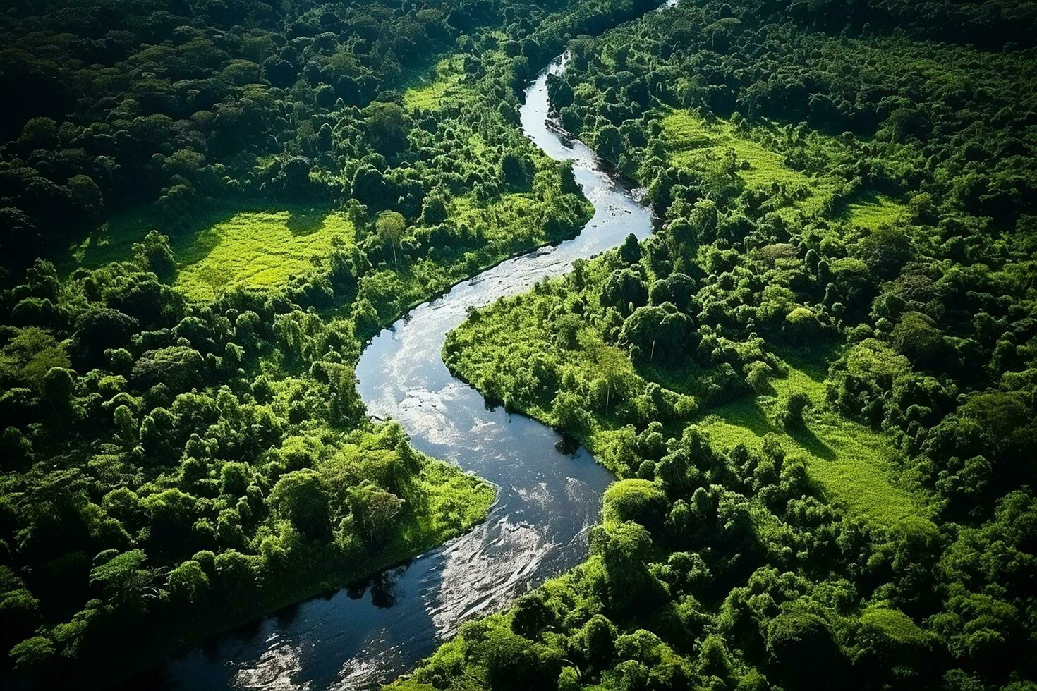 ai generado zumbido aéreo aves ojo ver de un grande verde césped bosque con alto arboles y un grande azul flexible río fluido mediante el bosque foto