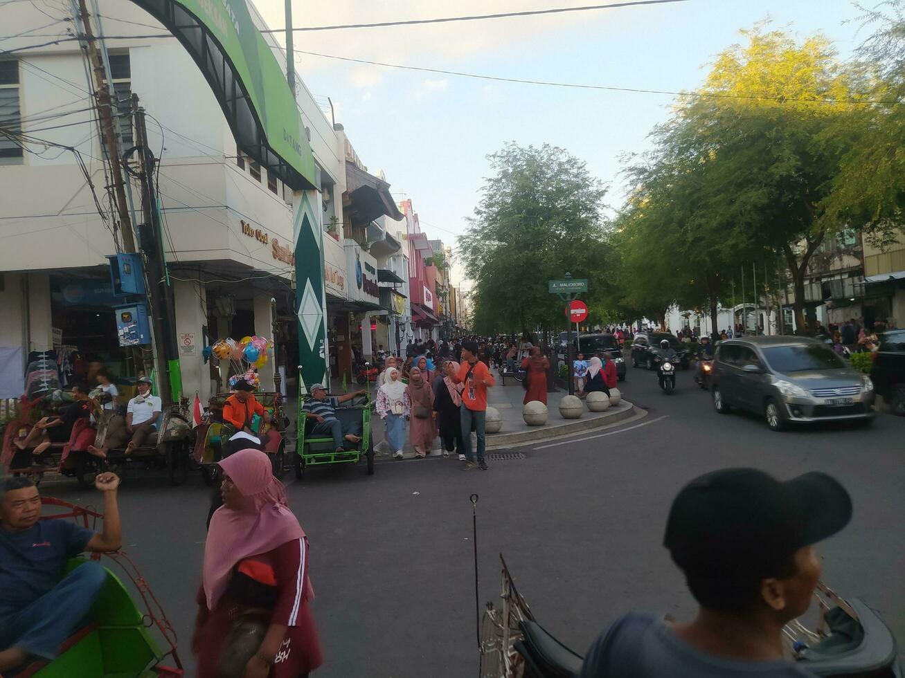 crowd of pedestrians on Malioboro Street photo