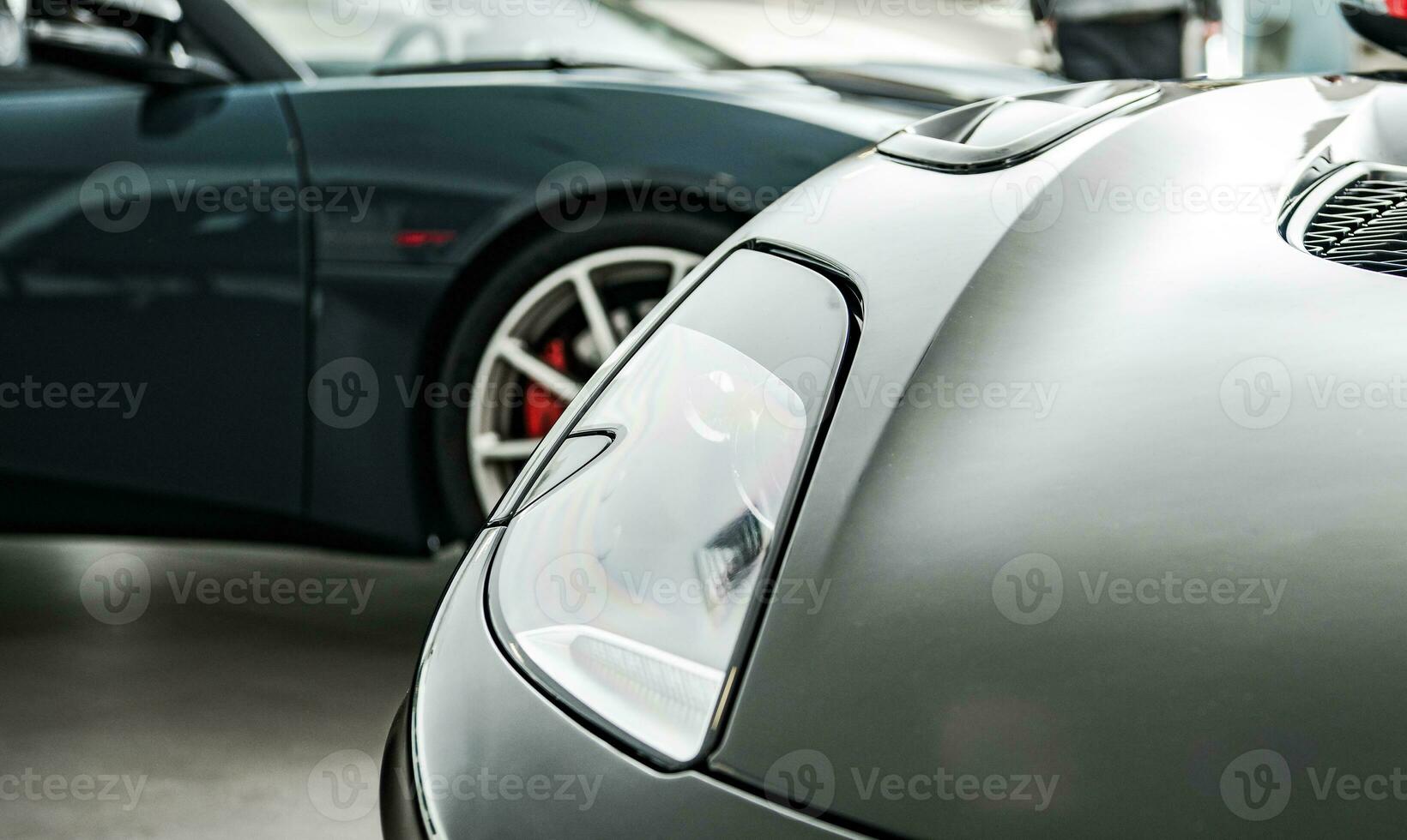 Brand New Luxury Cars Inside a Dealership Showroom photo