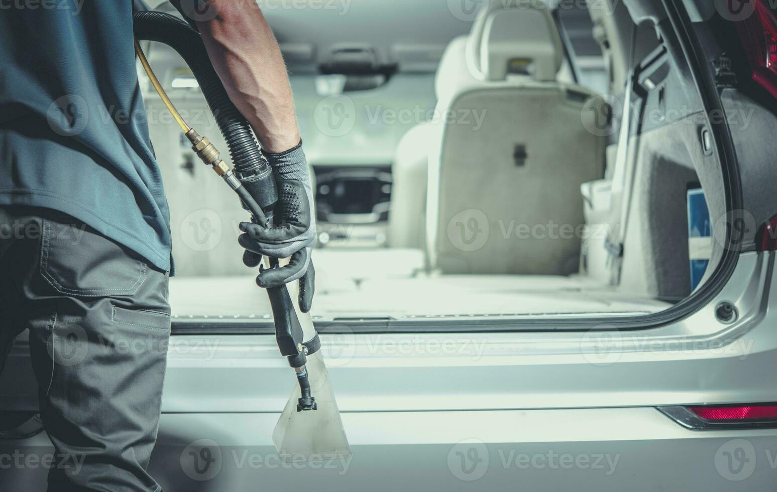 coche limpieza Servicio trabajador Pasar la aspiradora clientela vehículo foto