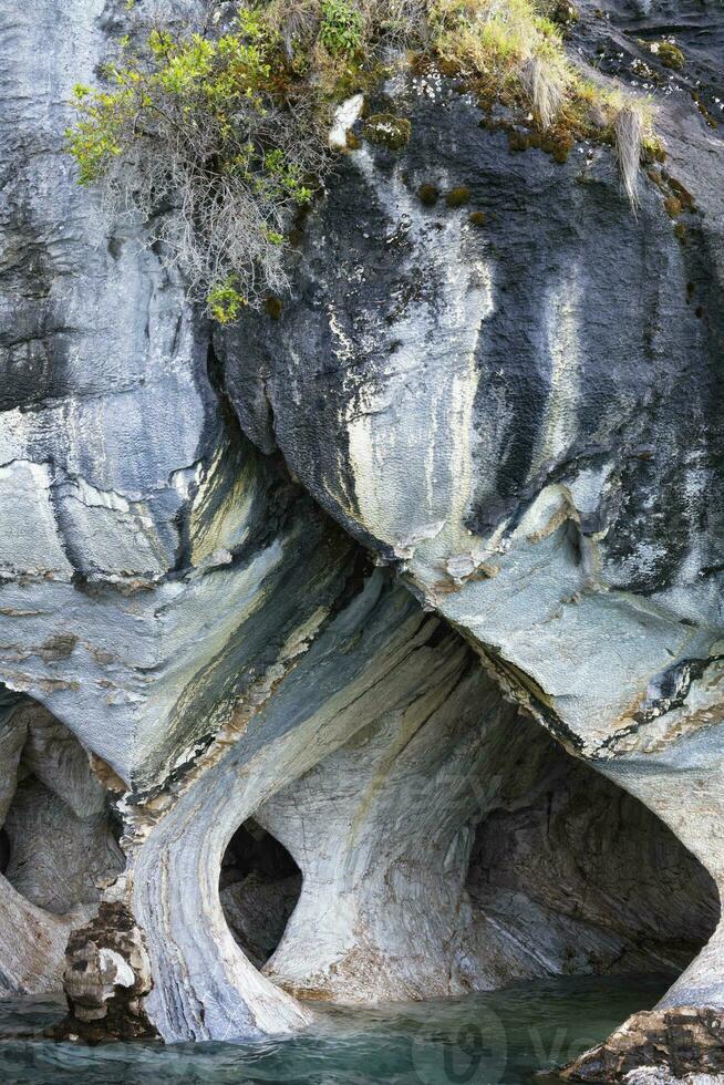 Marble Caves Sanctuary, Strange rock formations caused by water erosion, General Carrera Lake, Puerto Rio Tranquilo, Aysen Region, Patagonia, Chile photo